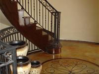 Tan concrete floor with staircase